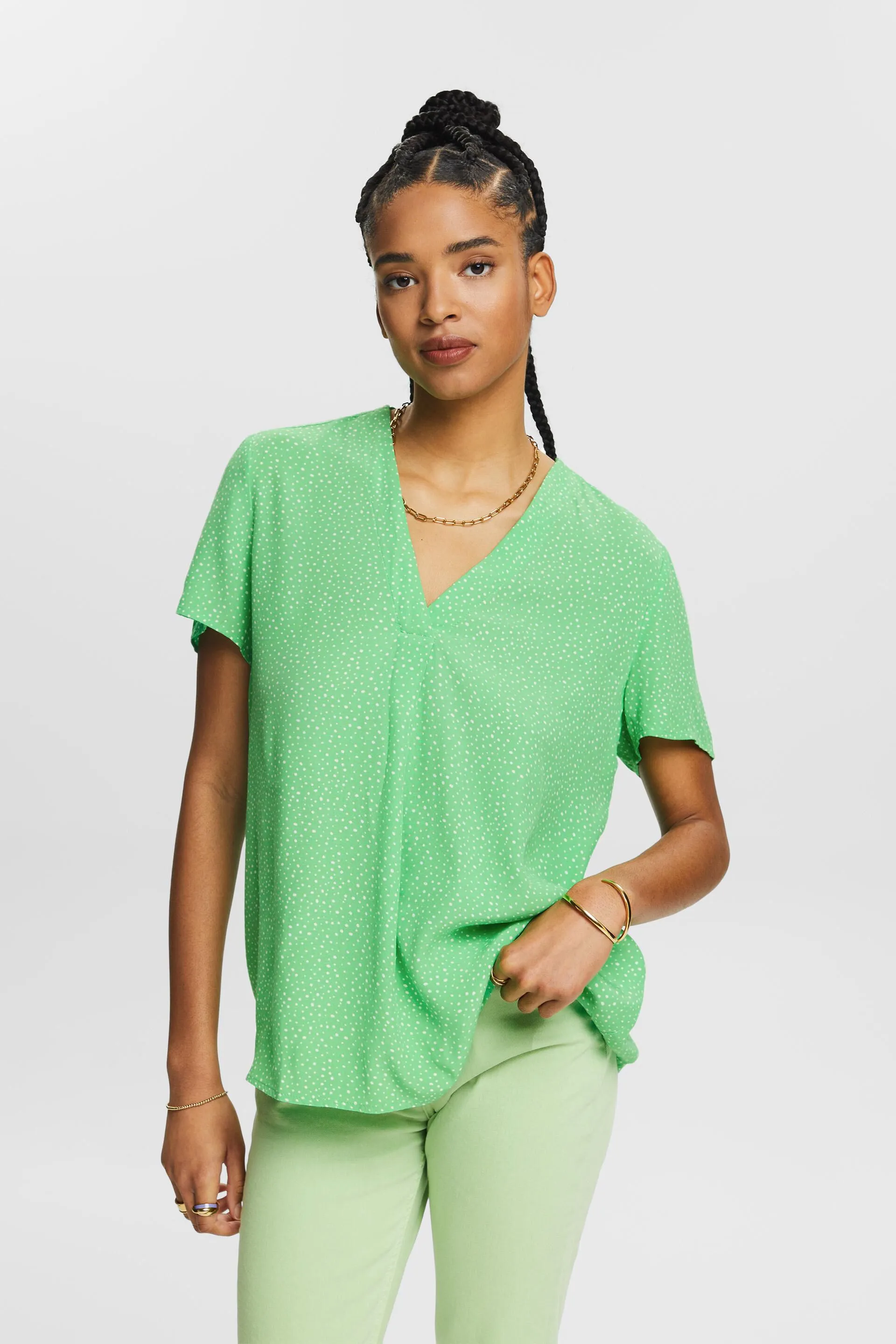 Blusa con stampa e scollo a V