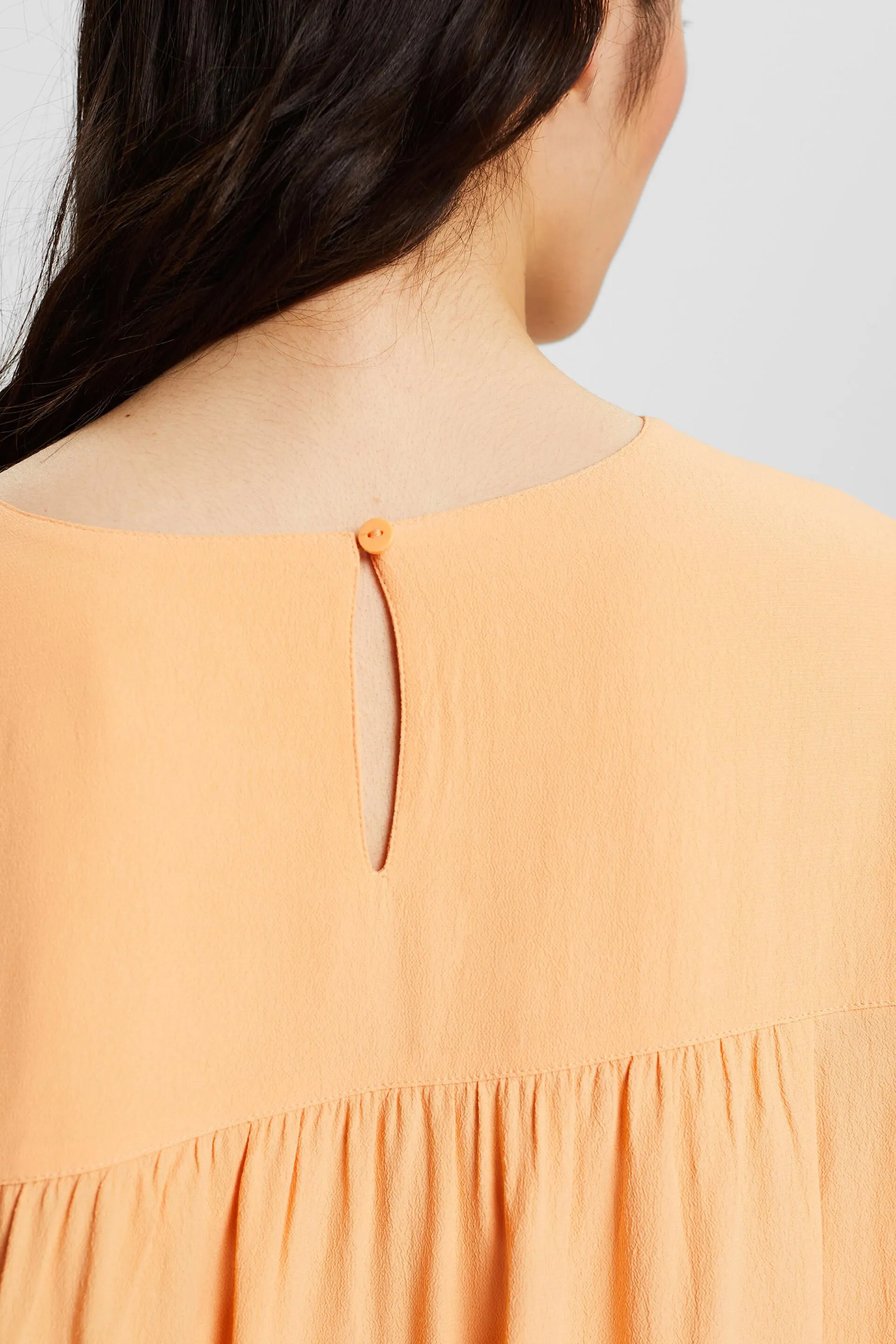 Blusa in crêpe a maniche lunghe