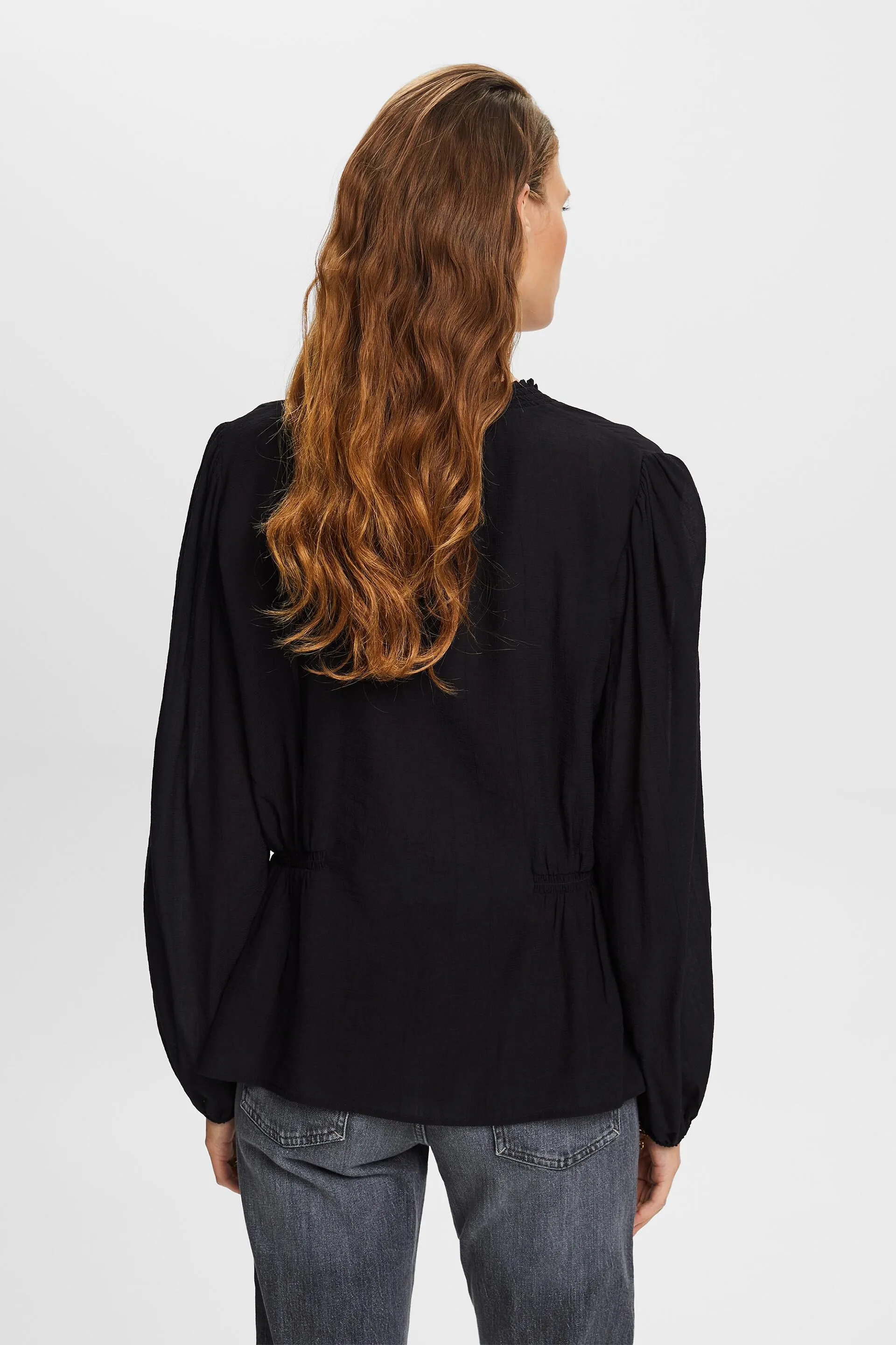Blusa in crêpe con scollo a V