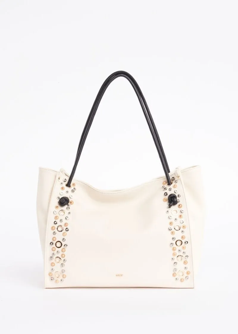Borsa shopper con occhielli e borchie