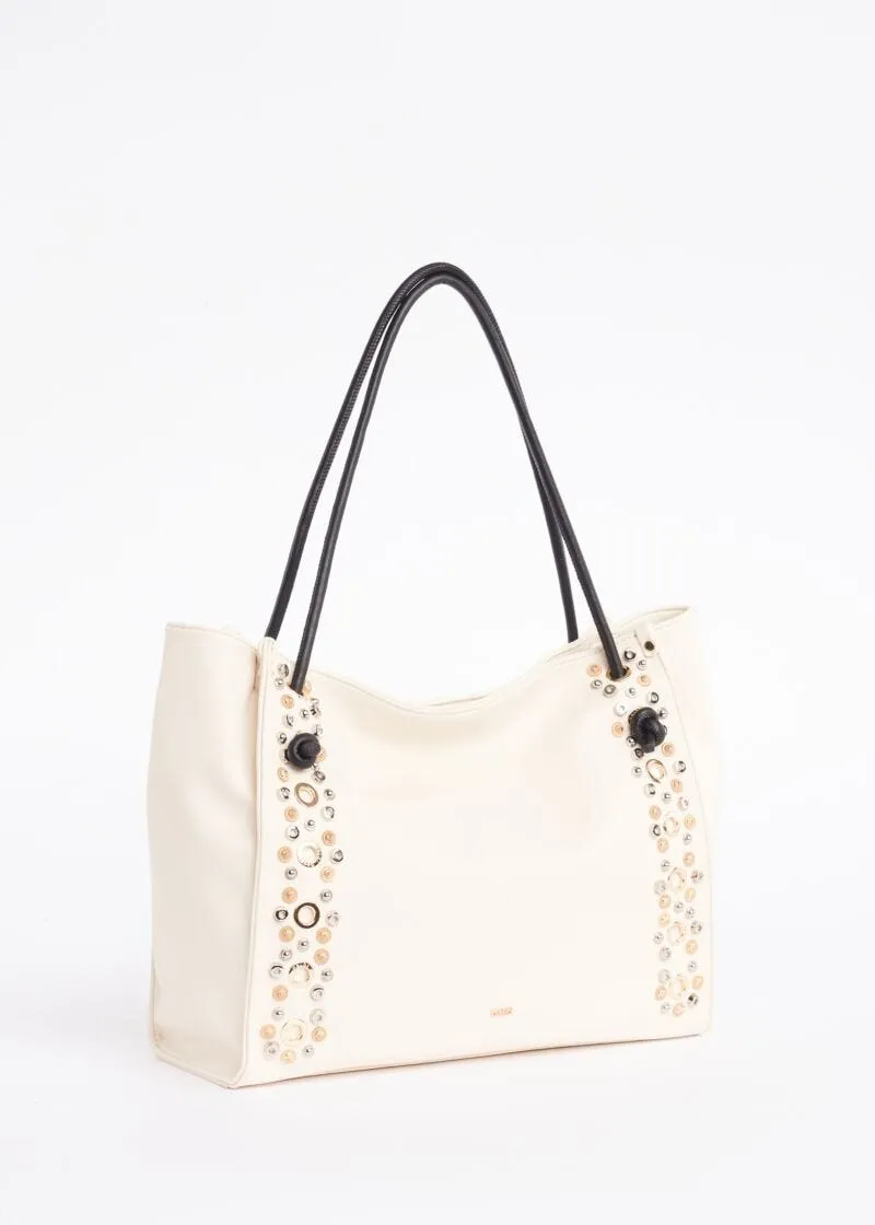 Borsa shopper con occhielli e borchie