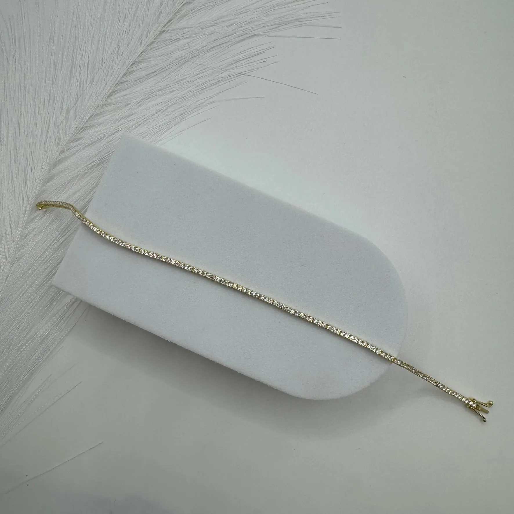 Bracciale tennis oro e zirconi