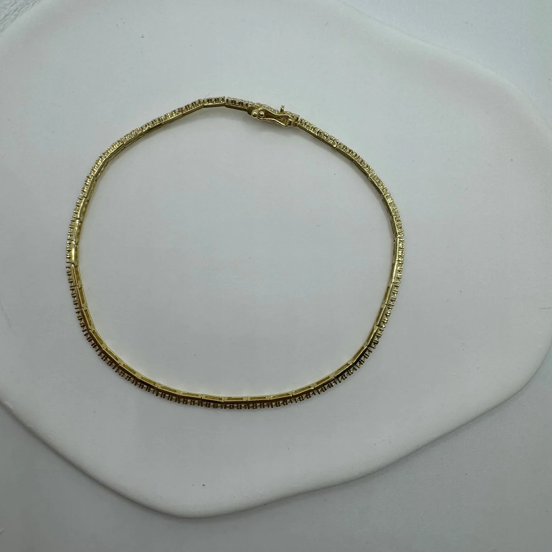 Bracciale tennis oro e zirconi