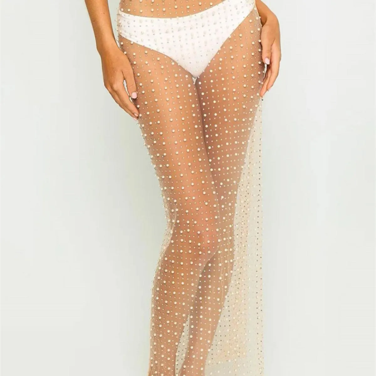 Copricostume trasparente trasparente alla moda per le donne Gonna da vacanza in spiaggia con spacco laterale Abiti in rete