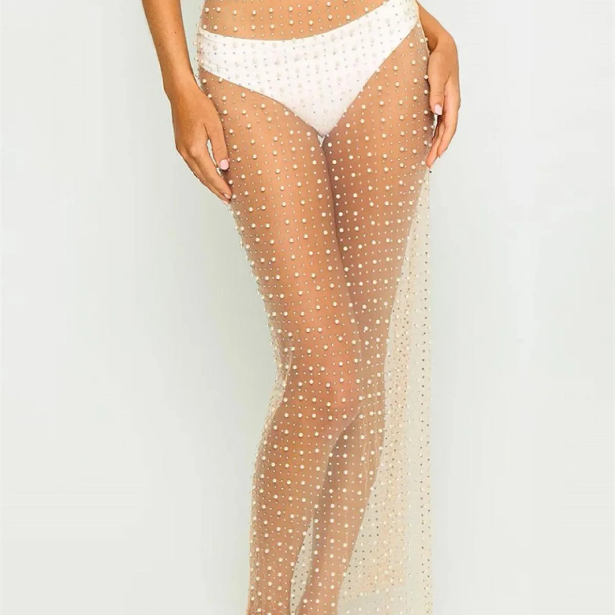 Copricostume trasparente trasparente alla moda per le donne Gonna da vacanza in spiaggia con spacco laterale Abiti in rete