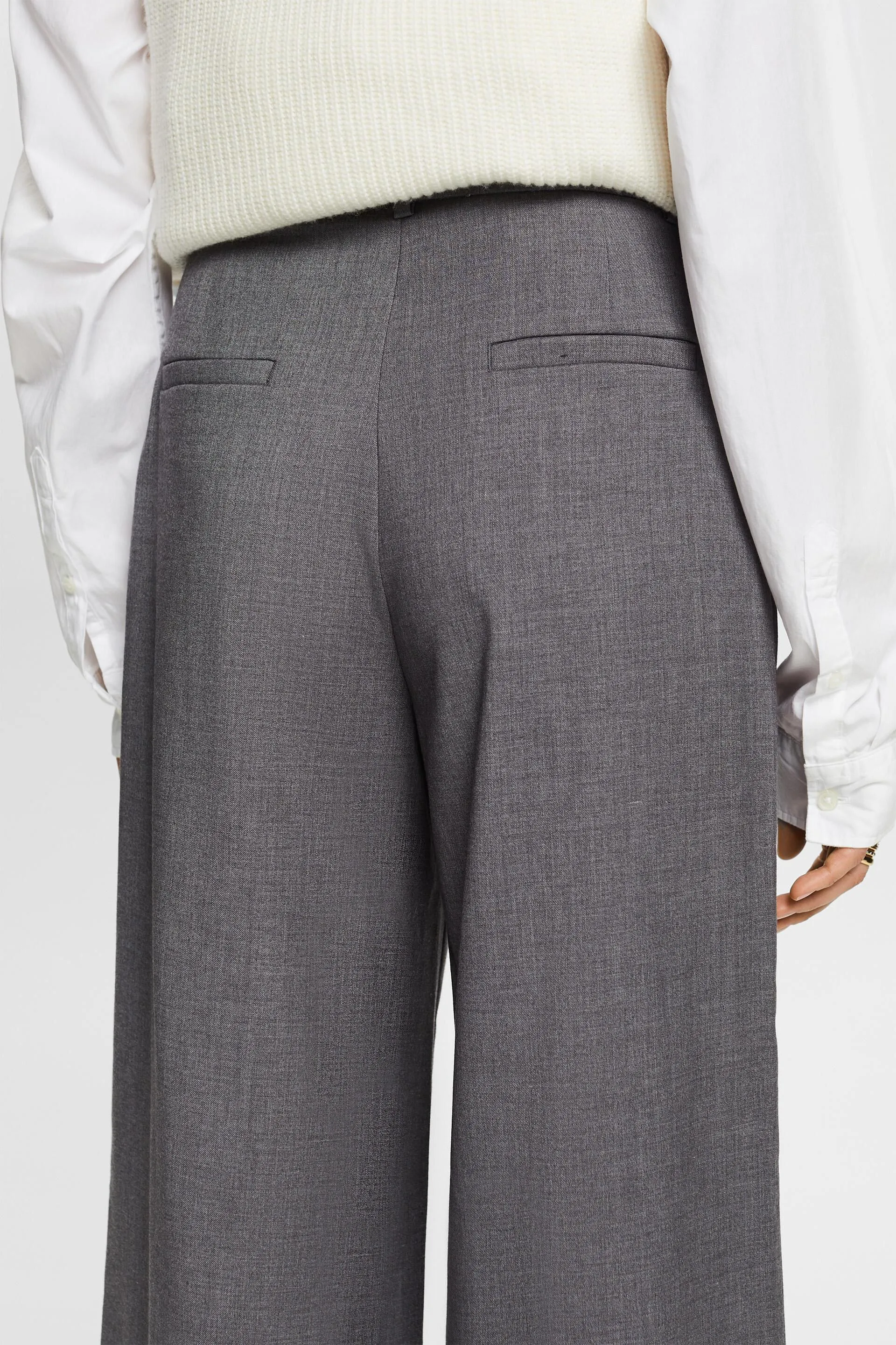 Pantaloni a gamba larga con piega a vita alta