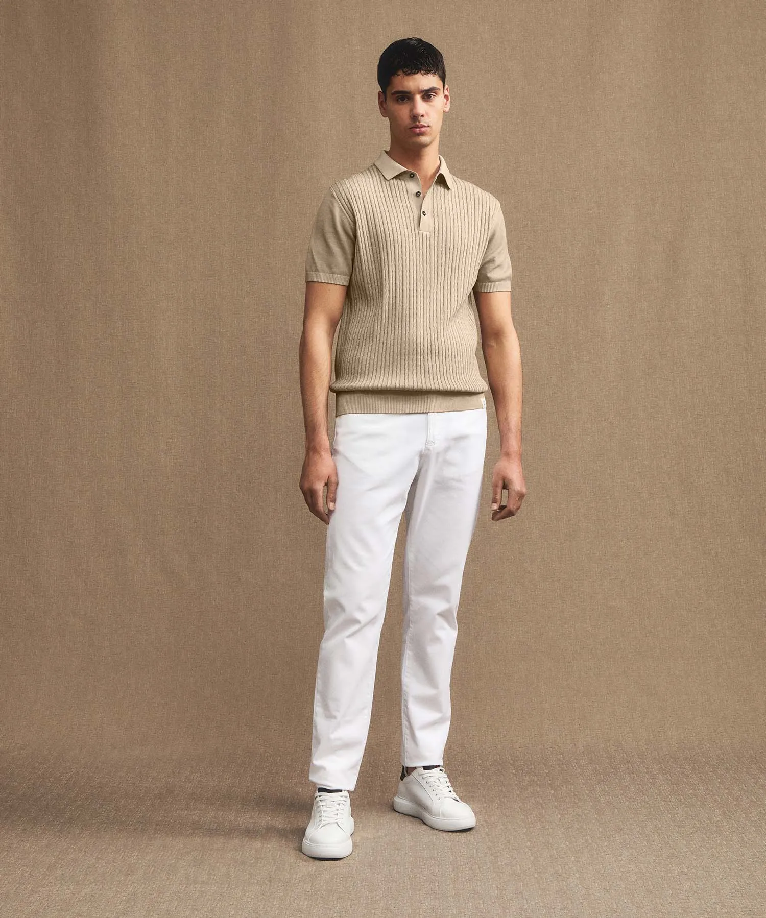 Polo a treccia in tricot di cotone