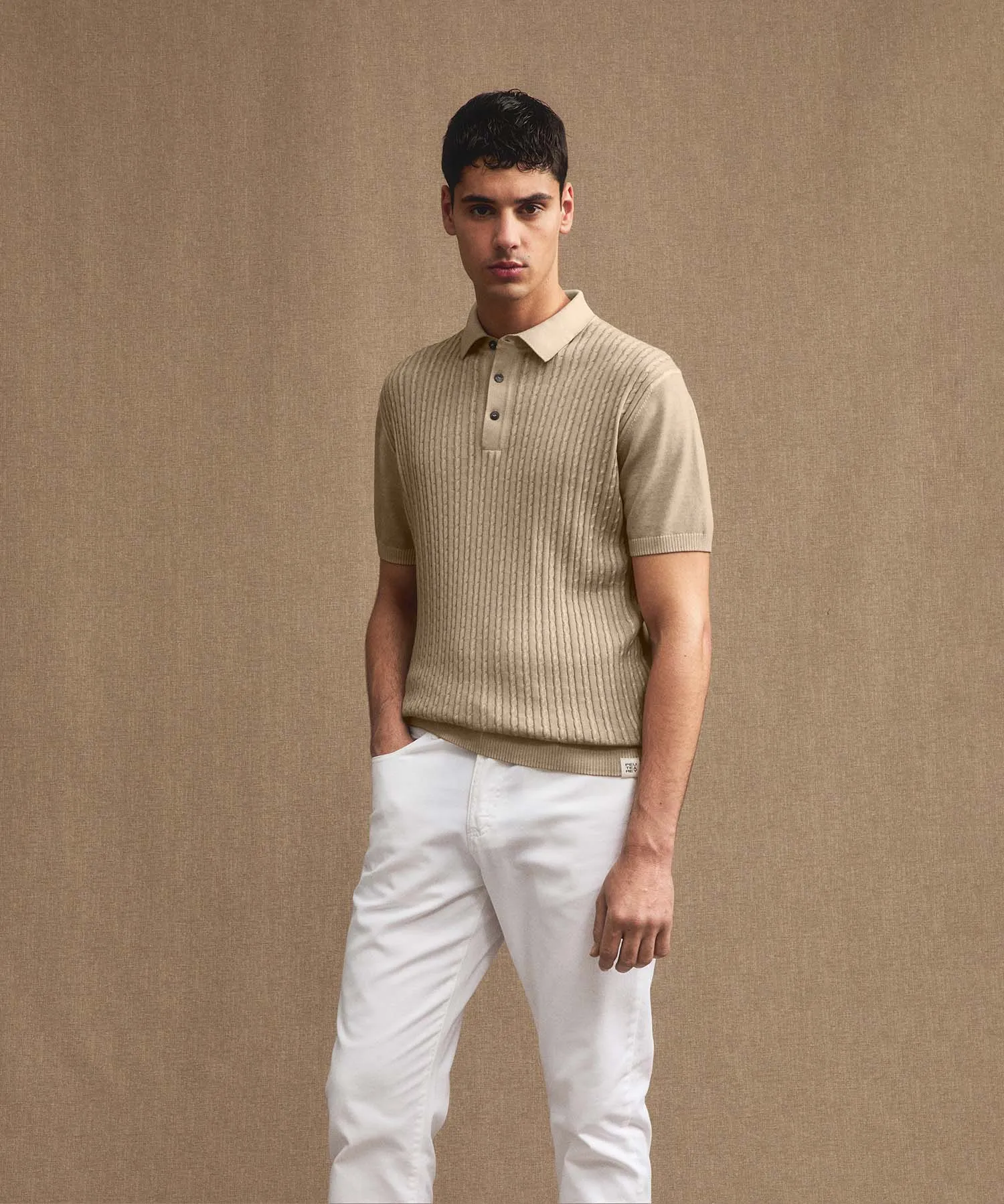 Polo a treccia in tricot di cotone