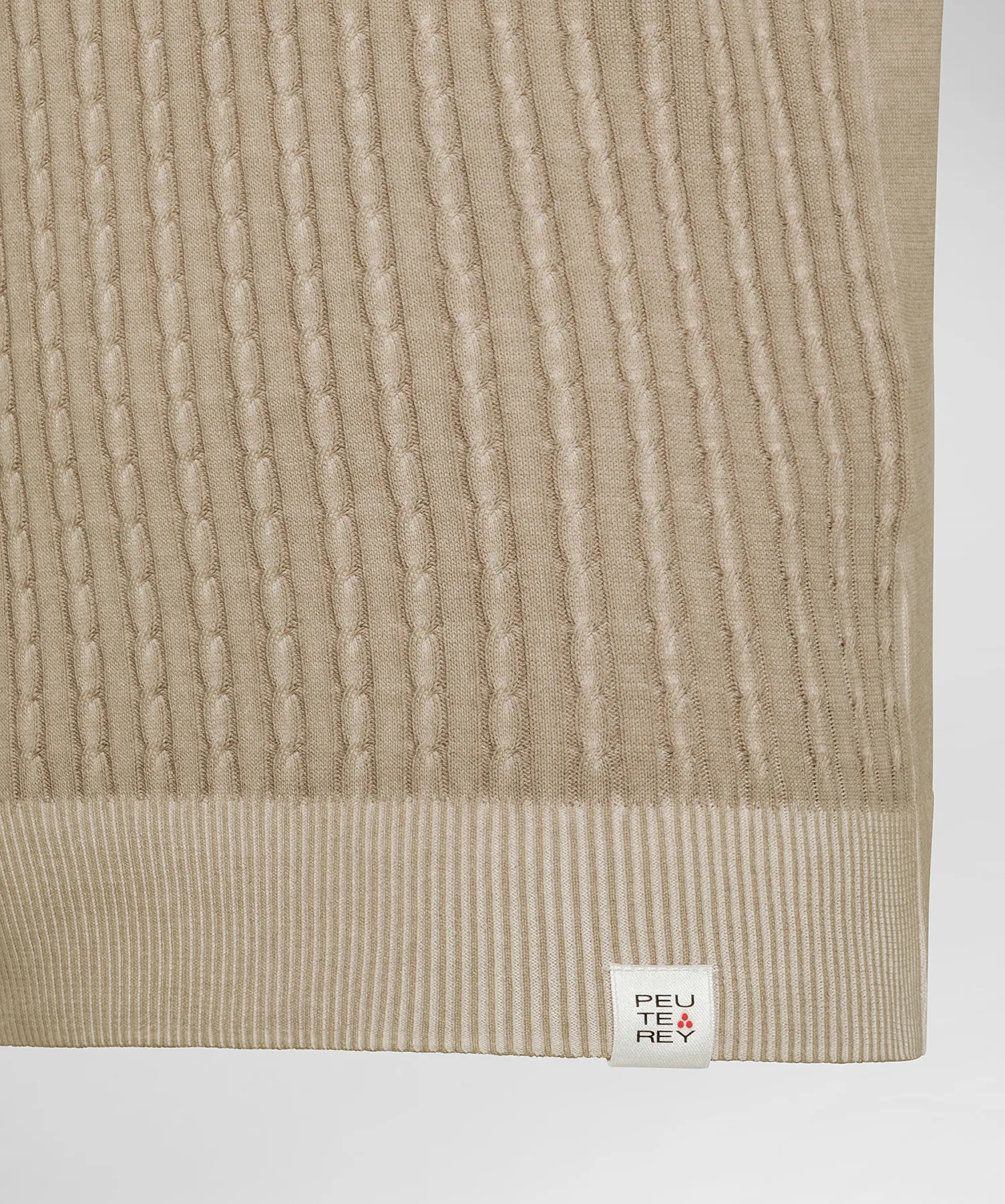 Polo a treccia in tricot di cotone
